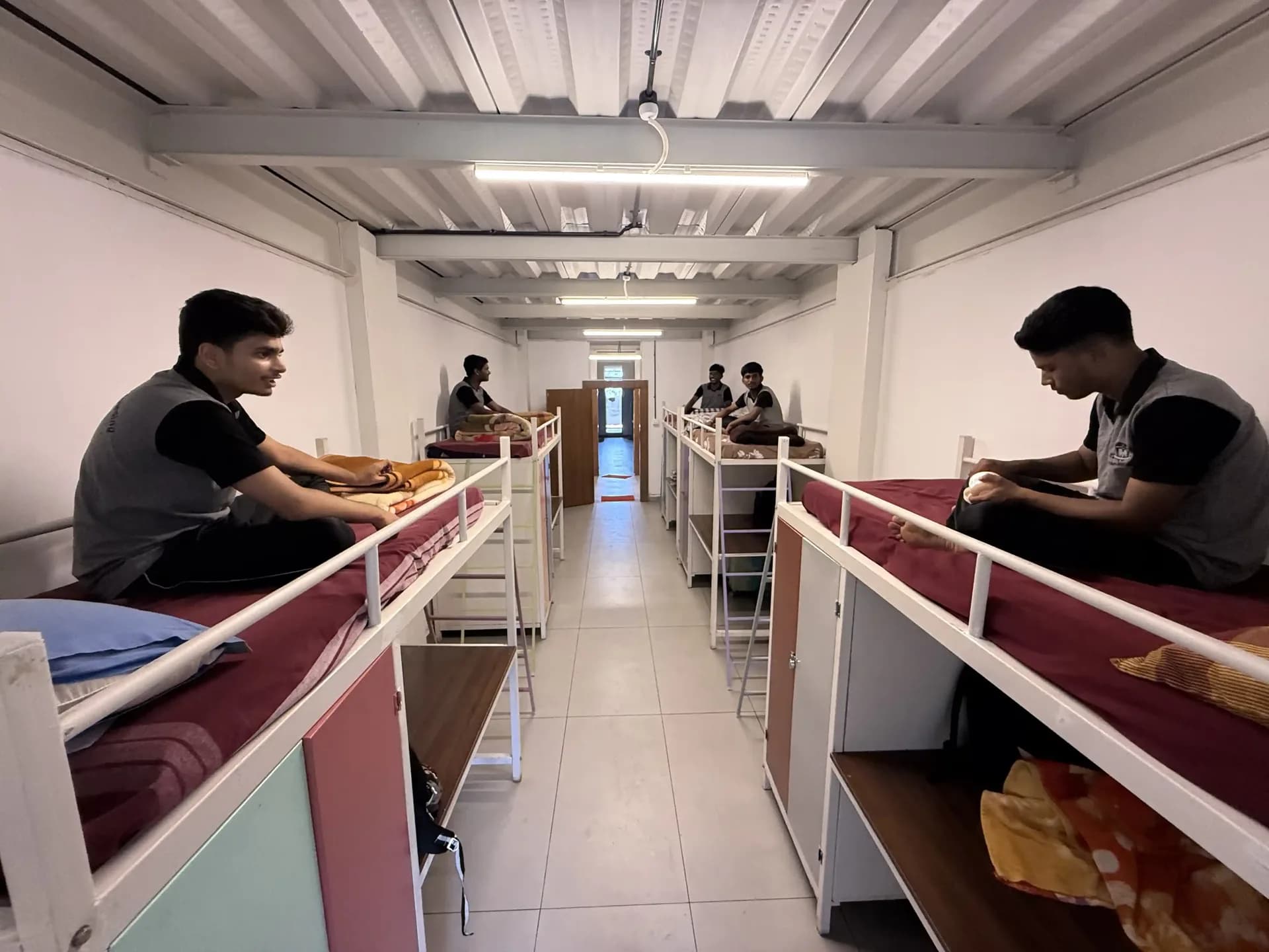 Students at Freddie House relaxing together in their room